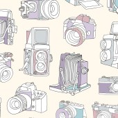 Seamless pattern with film and digital photographic or photo cameras on light background
